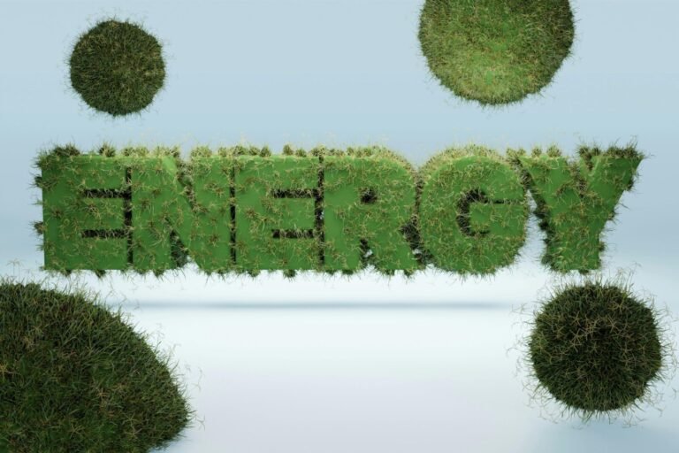 3D render of the word 'ENERGY' covered in grass, symbolizing green energy and sustainability.